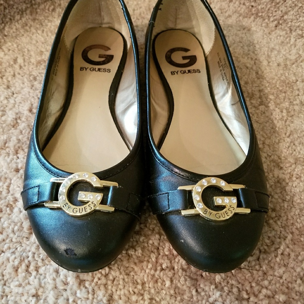 GUESS black flats with gold hardware